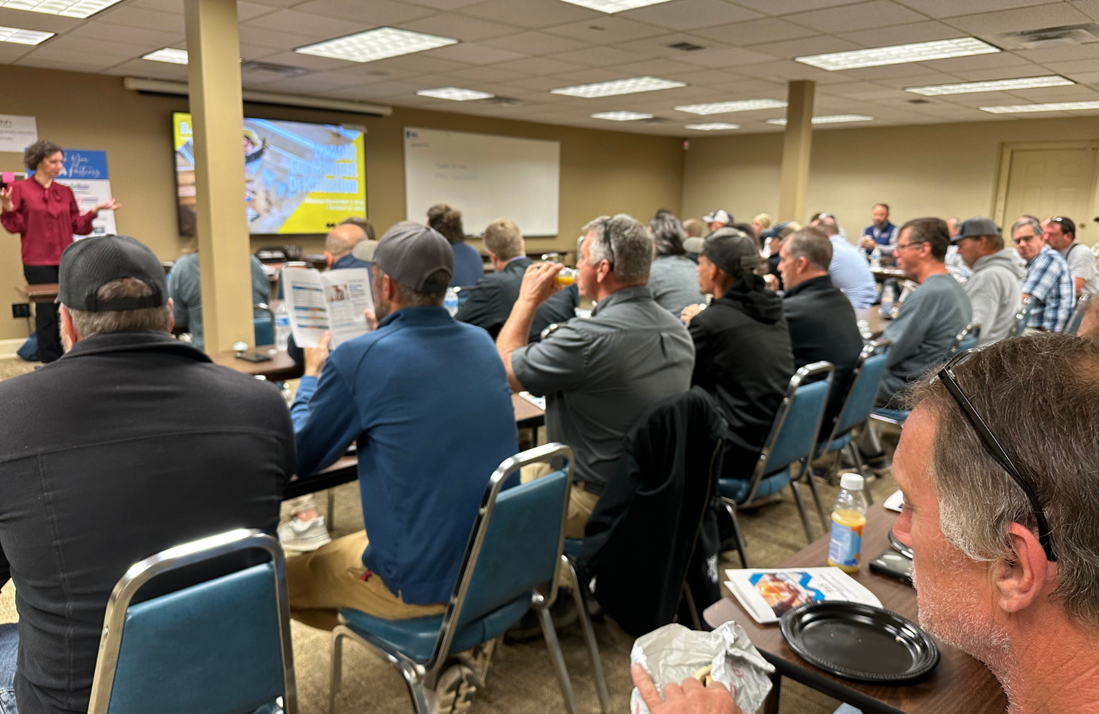 The BACK Construction team enjoying a company breakfast, showcasing our employee-focused and collaborative culture.