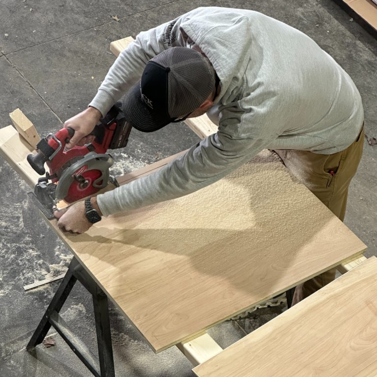 BACK Construction handyman in Lexington, KY completing a homeowner’s honey-do list, including drywall repairs, trim installation, and door adjustments.